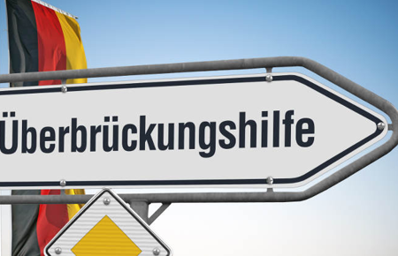 Überbrückungshilfe III Weißes Verkehrsschild